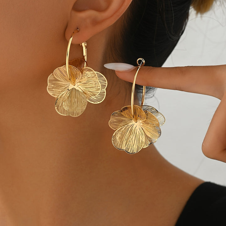 Exaggerated Gold Hollow Earrings